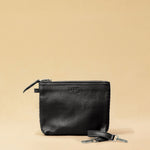 The Braided Pouch GAIA by LABEL17 is hand-braided from soft, vegetable-tanned nappa leather using an intricate braiding technique. Designed to carry your essentials, it features a leather strap with a carabiner, allowing you to wear it on its own or attach it seamlessly inside your LABEL17 bag.