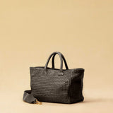The Cabas Medium by LABEL17 is a lightweight handbag crafted from supple, vegetable-tanned nappa leather. Hand-braided and finished with a zip closure and detachable shoulder strap, it features a leather-lined interior with a secure inner pocket – combining refined design with everyday functionality. Handmade in Morocco.