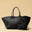 The Shoulder Bag ORIGINAL XL (Weekender) by LABEL17 is made from supple, vegetable-tanned nappa leather. The hand-braided leather bag can be made smaller on both sides from the inside with press studs and also includes a detachable, hand-braided pouch for organization inside the bag.