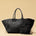 The Shoulder Bag ORIGINAL XL (Weekender) by LABEL17 is made from supple, vegetable-tanned nappa leather. The hand-braided leather bag can be made smaller on both sides from the inside with press studs and also includes a detachable, hand-braided pouch for organization inside the bag.