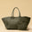 The Shoulder Bag ORIGINAL XL (Weekender) by LABEL17 is made from supple, vegetable-tanned nappa leather. The hand-braided leather bag can be made smaller on both sides from the inside with press studs and also includes a detachable, hand-braided pouch for organization inside the bag.