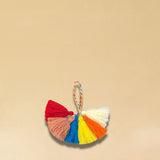 Der farbiger Wool-Pompom von LABEL17 kann als Taschenzubehör, gefertigt aus reiner Schurwolle. Hergestellt in einer Frauenkooperative in Marokko.