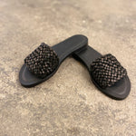 Flat leather Sandal RIVIERA by LABEL17, crafted from fine, hand-braided lamb nappa leather. Featuring a 1.5 cm heel with a Vibram sole for durability and comfort. The leather is meticulously braided by hand in Morocco before being handcrafted into the final sandal in Greece.