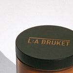 L:A BRUKET Scented Candle, 260g - Black Oak, bei LABEL17