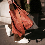 LABEL17 presents the Handbag Tresse Lou in Brick. Hand-Braided Lamb-Nappaleather, crafted in Morocco