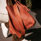 LABEL17 presents the Handbag Tresse Lou in Brick. Hand-Braided Lamb-Nappaleather, crafted in Morocco